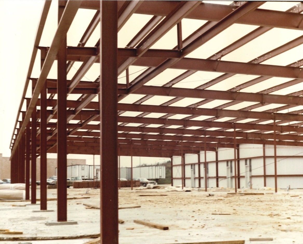 An early Rhodes Building Systems steel frame under construction