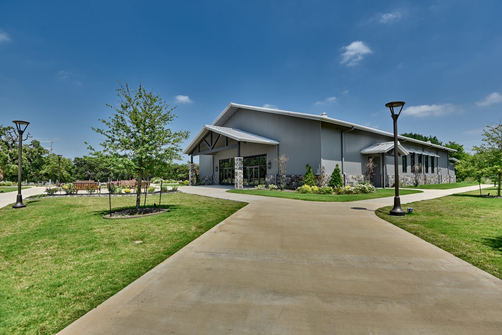 Exterior from the walkway, showing the entry canopy and the window canopies along the side