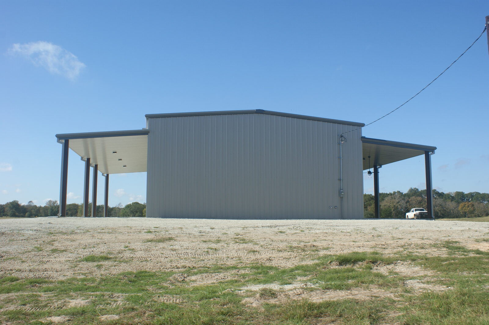 End elevation showing the lean-to roof dropped two feet below the main roofline