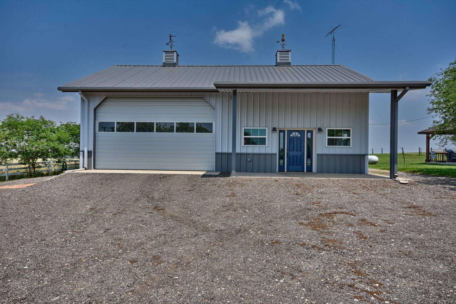 Front elevation of the garage and game room, showing the porch stopping short of the building's full length